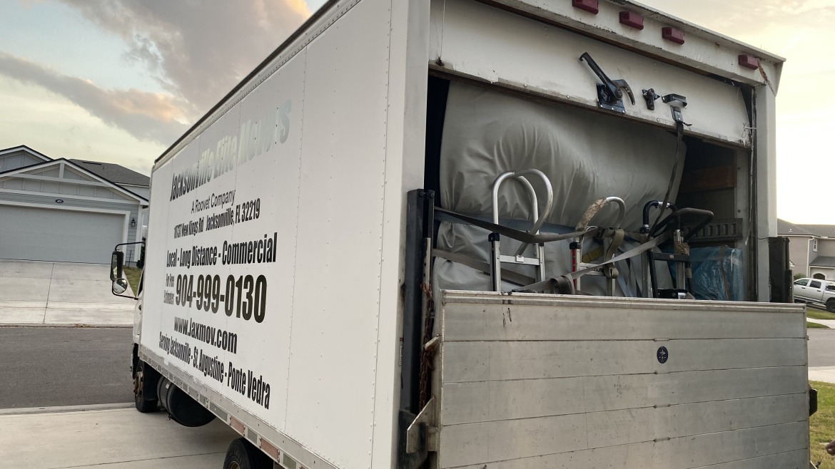 Jacksonville Elite Movers truck loaded with protected furniture